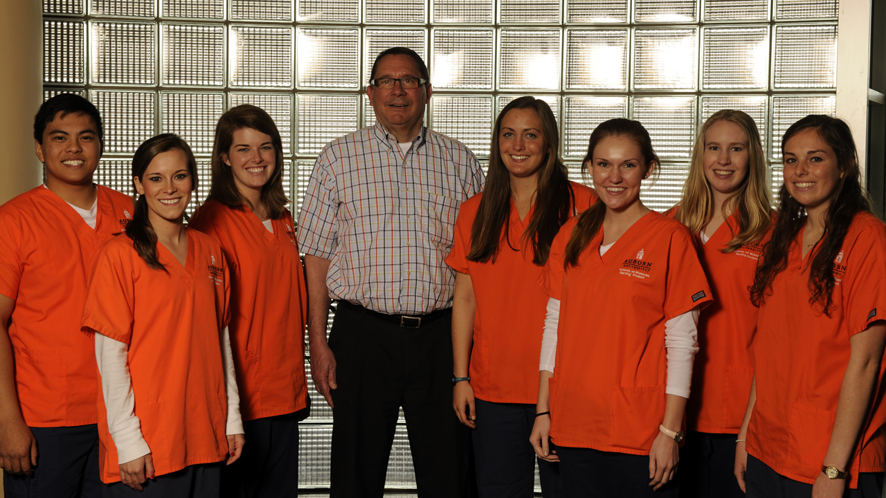 EAMC President and CEO Terry Andrus with Auburn Nursing students.